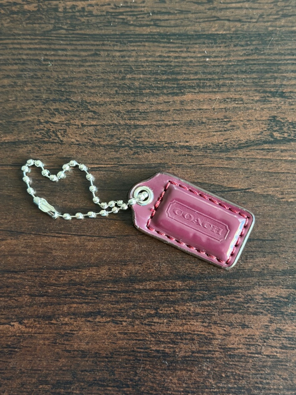 Coach violet/pink leather hangtag
